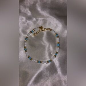 White, blue, and gold beaded adjustable bracelet for women